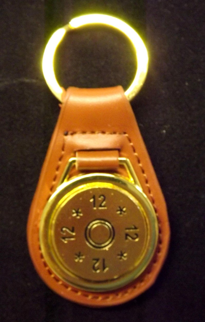 gold plated representation of a head stamp on
