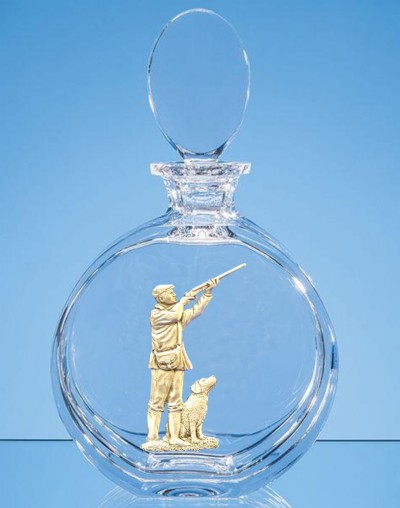 round crystal decanter with silver plated man shooting embellishment